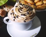 صورة لخطوة 1 من وصفة اطيب قهوة معا حلوى البلميي☕🍫