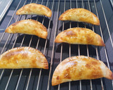 Foto del paso 4 de la receta: Empanadillas vegetarianas de espinacas y piñones al horno