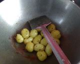 A picture of step 3 of Baby potatoes with Chana Dal.
