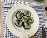 A picture of step 9 of Sushi vegetable roll.