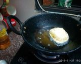 A picture of step 7 of Rice flour poori.