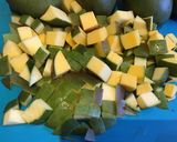A picture of step 2 of California Farm Green Mangos Pickled in Pepper Oil.