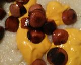 A picture of step 4 of Cheesy Grits with Hotdogs and Eggs.