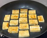 A picture of step 5 of Pan-Fried Tofu and Eggs with Oyster Sauce.