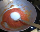 A picture of step 3 of Papaya modak.
