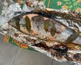 Une image de l'étape 13 de Saumon sauvage en papillote à l ail mariné et herbes aromatiques.