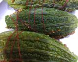 A picture of step 7 of Bharwa karela.