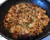 Une image de l'étape 11 de Porc aux tomates séchées, ail mariné, oignon et épices italiennes.