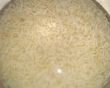 A picture of step 1 of Tomato carrot rice.