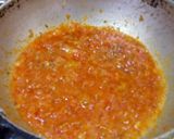 A picture of step 2 of Punjabi dal tadka with salad and roti.