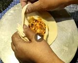 A picture of step 8 of Cheesy Paneer Potlis.