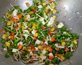 A picture of step 2 of Veggie Idlis with coconut and red chutney.