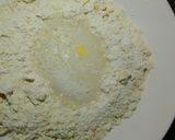 A picture of step 4 of Coconut mandazis.