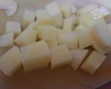 A picture of step 3 of Khattay aloo.