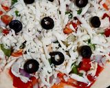 A picture of step 6 of Chicken tikka pizza.
