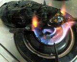 A picture of step 1 of Brinjal chokha.