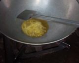 A picture of step 4 of Aloo posto.