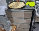 Foto del paso 9 de la receta: A la masa con los niños de la casa, pizza casera para hacer en familia