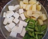 A picture of step 2 of Potato Paneer curry.