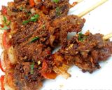 A picture of step 7 of Tsire Skewers.
