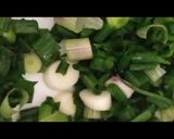 A picture of step 1 of Spring onion coriander mint chutney.