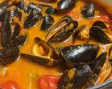 A picture of step 10 of Spicy fish + mussel tomato stew.