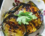 A picture of step 2 of Baigan Bhaja.