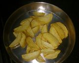 A picture of step 2 of Dahi alu.