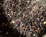A picture of step 1 of Kavuni Arisi Kanji / Black Rice Porridge.