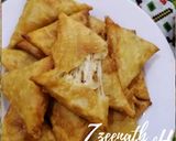 A picture of step 4 of Cheese Loaded Samosas.