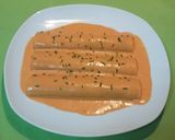 Foto del paso 7 de la receta Canelones rellenos de brócoli y salmón con salsa de piquillos