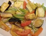 A picture of step 4 of Grilled Veg Hummus Rolls.