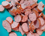 A picture of step 3 of Cucuzza and Sausage.
