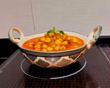 A picture of step 6 of Chana Masala.