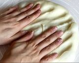 A picture of step 14 of Japanese soft and fluffy condensed milk bread.