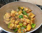 A picture of step 6 of Shimla mirch aloo sabzi.