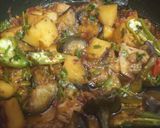 A picture of step 4 of Aloo baingan.