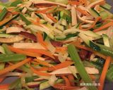A picture of step 9 of Stir-Fried Mixed Vegetables with Egg Crepe and Curry Sauce.
