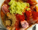 A picture of step 1 of Green Mango Chicken Curry.