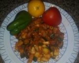 Foto del paso 5 de la receta Calabacín salteado con tomates y hierbas aromáticas