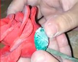 A picture of step 11 of Valentines day special fondant red rose cake topper.