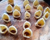 A picture of step 7 of Layered Diya Mathri.