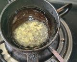 A picture of step 2 of Onion and Tomato Tempered Curd Rice.