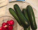 A picture of step 1 of Zucchini Spaghetti with Tomato Sauce, Kalamata Olives, Feta, and Radishes.