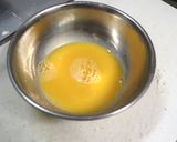 A picture of step 2 of Cheese chicken katsu.