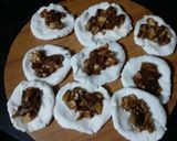 A picture of step 2 of Bihur guror nariyal pitha.