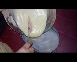 A picture of step 7 of Australian cake.. chocalate toping on vanilla cake.