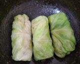 A picture of step 12 of Nutty lemony cabbage roll in green sauce.