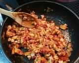 Foto del paso 5 de la receta Pimientos al gratén rellenos de cerdo especiado