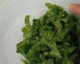 A picture of step 2 of Jingalov hats Armenian herb stuffed flatbread .
